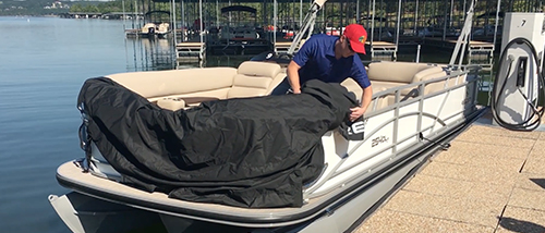 Sun Tracker Rail-Lock Pontoon Cover At The Dock